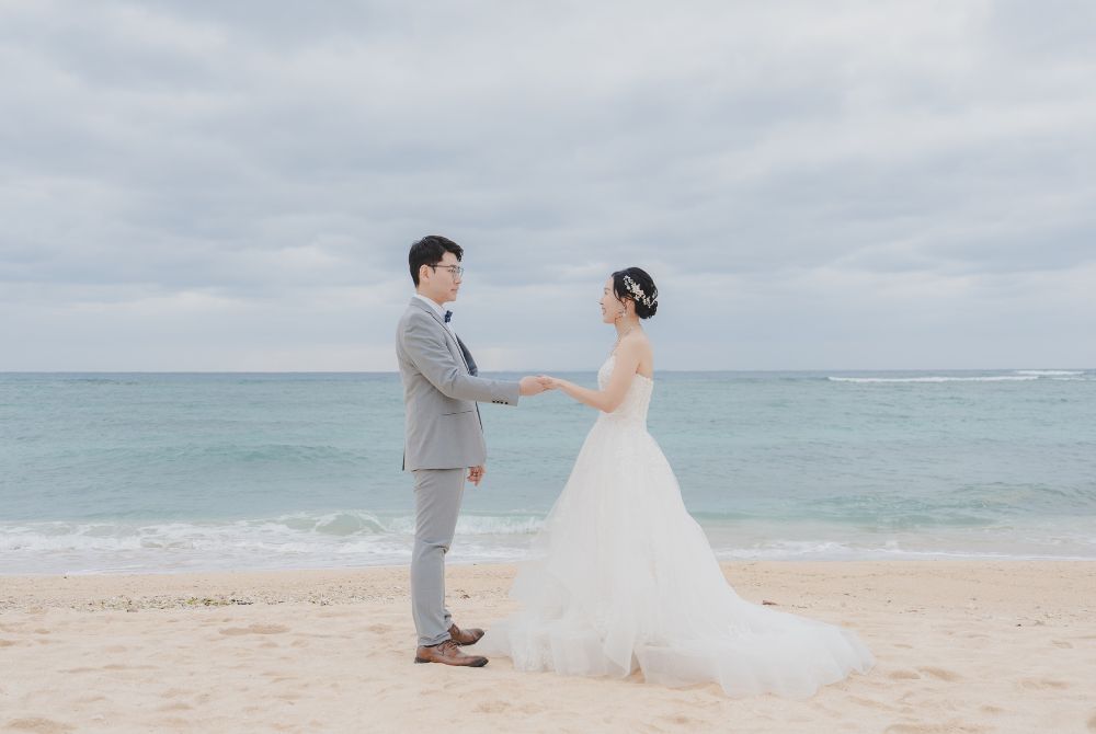 A couple holding each othe's hand