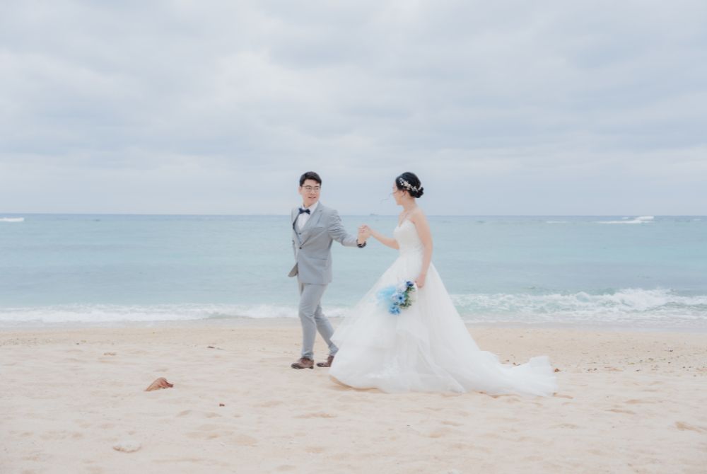 holding bride's hand gently