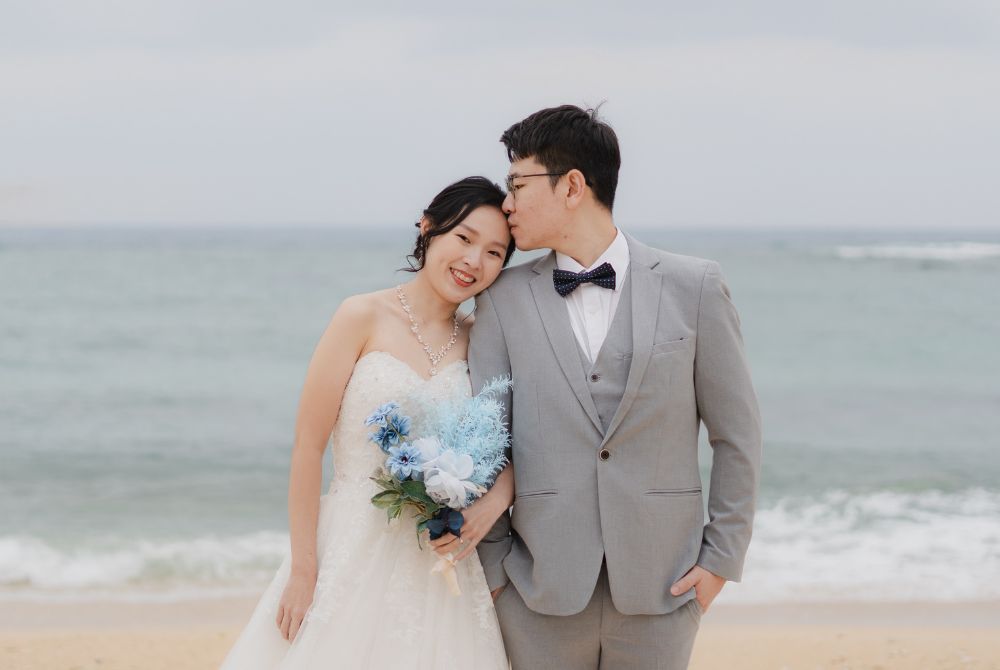 groom kissing the bride