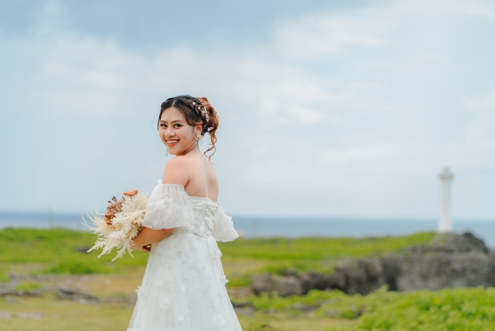 solo shot of the bride in white dress