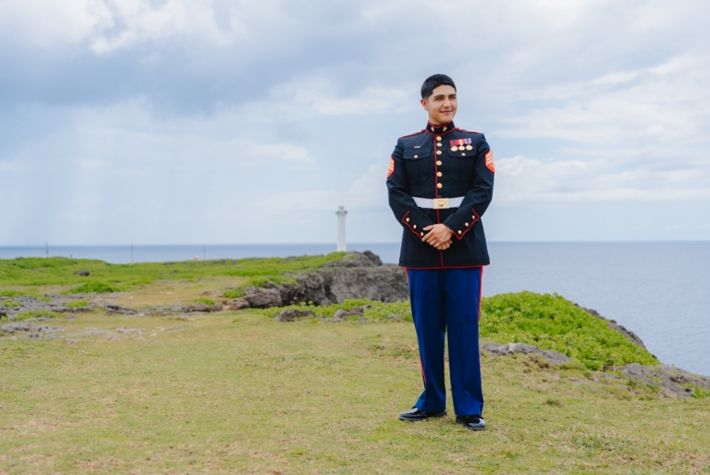 solo shot of groom in his uniform