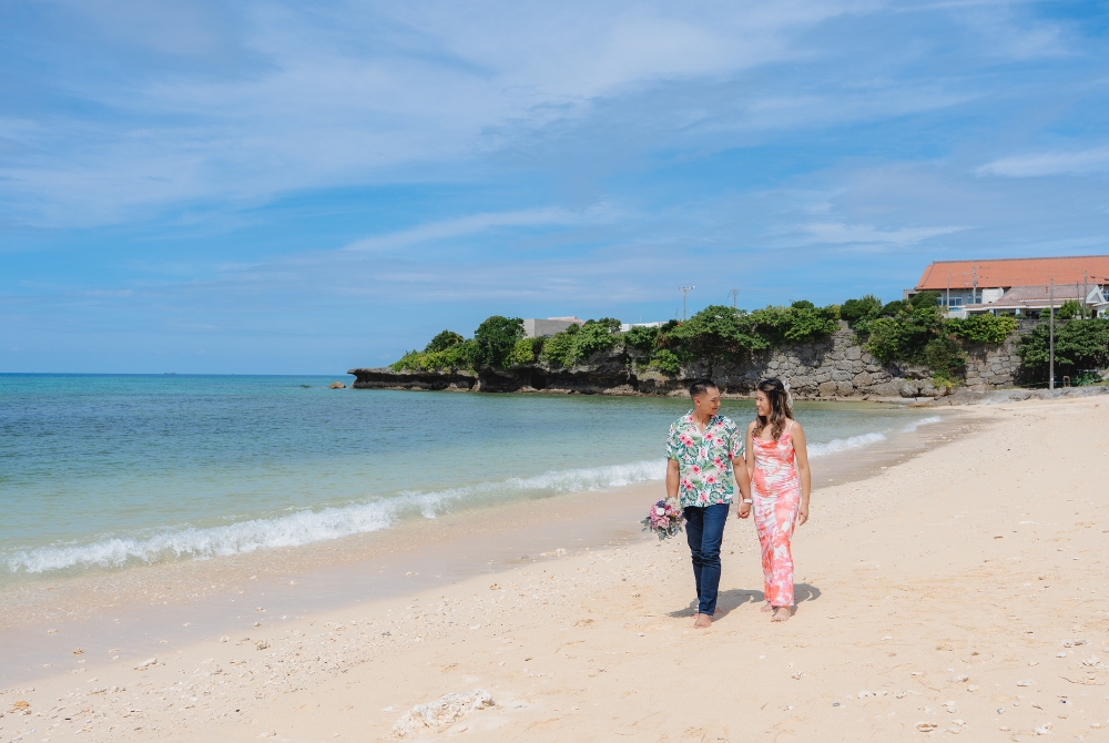 A couple walking in beach Okinawa
