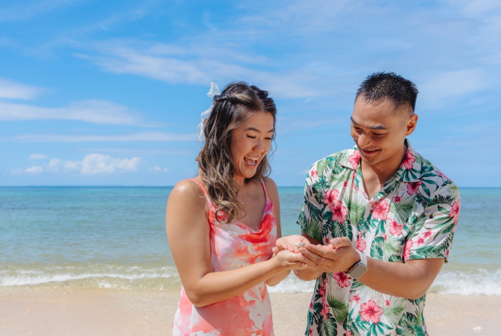 Happy couple with a hermit crab